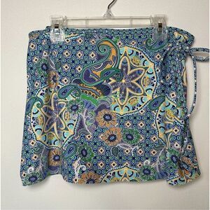 Athleta women’s multi-color floral mini wrap skirt size Medium. #40-1403